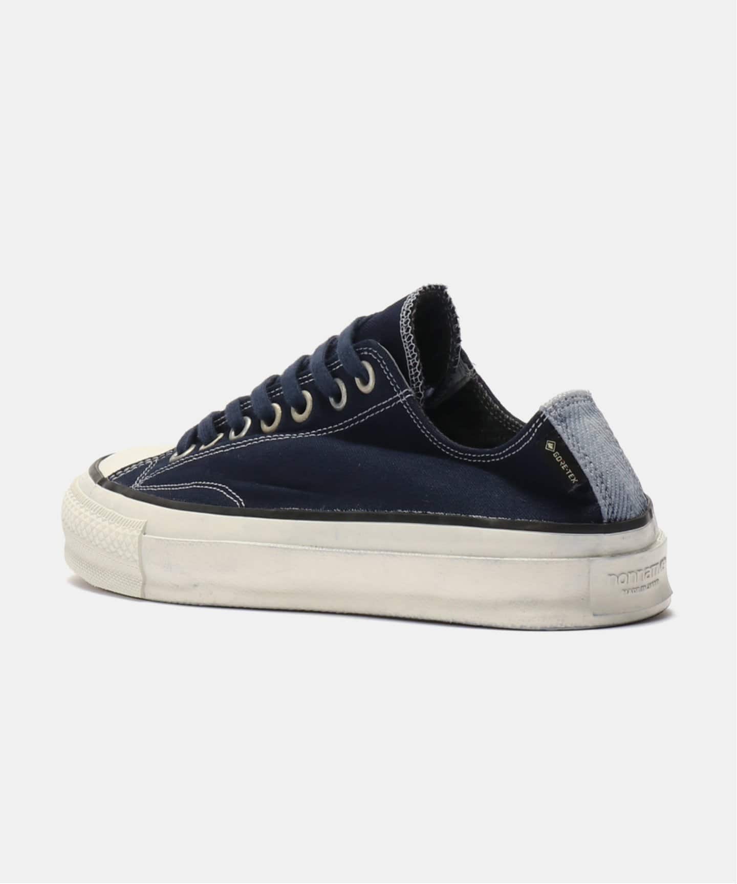 nonnative DWELLER TRAINER LOW COTTON CANVAS OVER DYE WITH GORE-TEX by SPINGLE