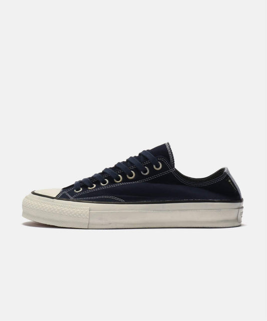 nonnative DWELLER TRAINER LOW COTTON CANVAS OVER DYE WITH GORE-TEX by SPINGLE